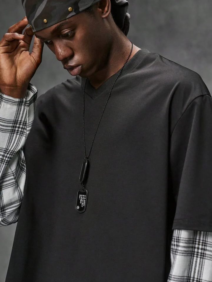 T-shirt with plaid patchwork sleeves