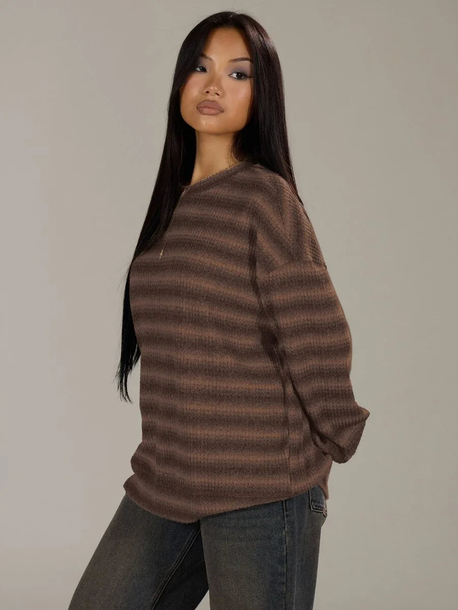 Oversized sweater with striped pattern