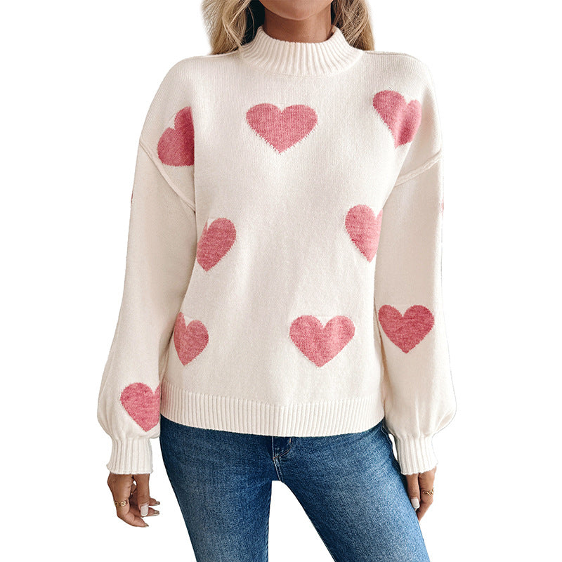 Sweater for women with knitted hearts and a high collar