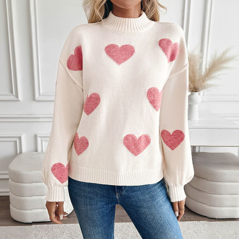 Sweater for women with knitted hearts and a high collar