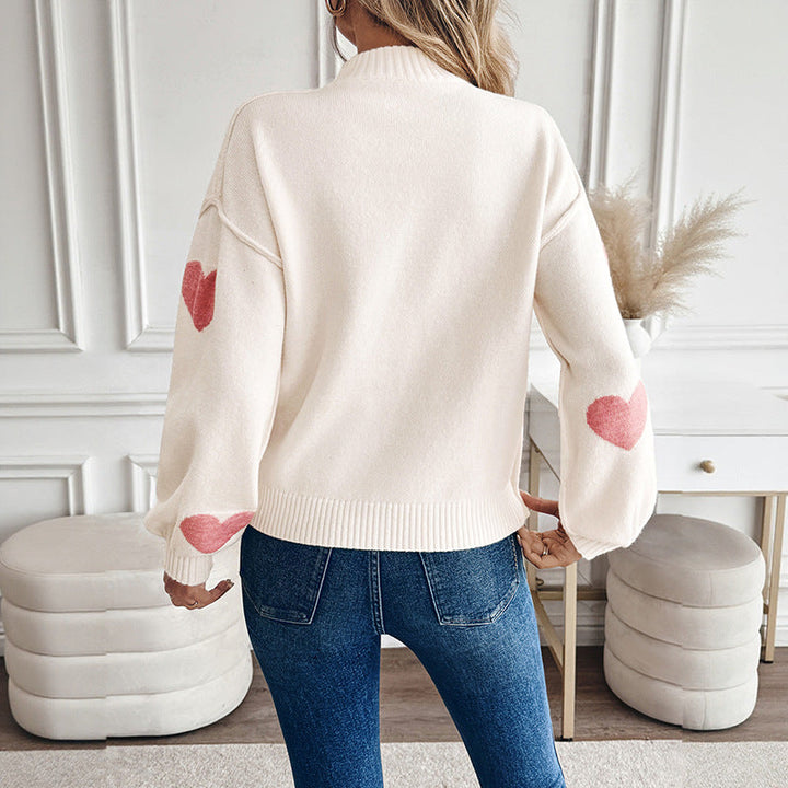Sweater for women with knitted hearts and a high collar