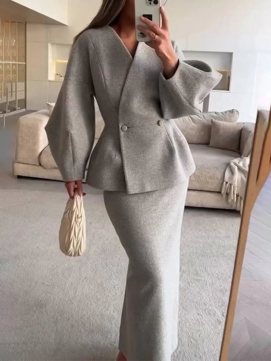 Two-Piece Skirt Suit with Puff Sleeve Blazer and V-Neck Detail